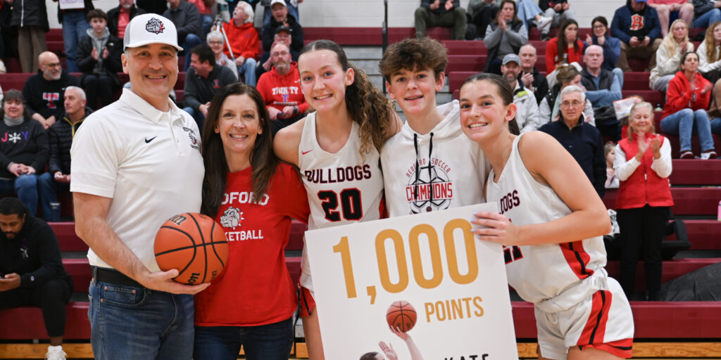 Allard nets 1000th point, leads Bedford past Trinity